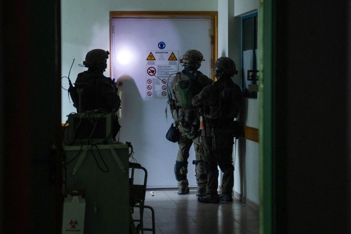 This handout picture released by the Israeli army on November 15, 2023, reportedly shows Israeli soldiers carrying out operations inside Al-Shifa hospital in Gaza City.