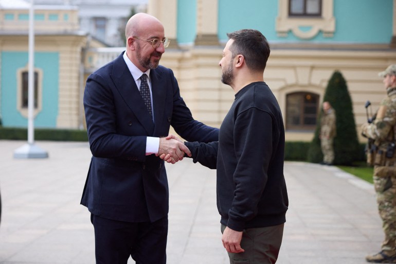 Ukrainian President Volodymyr Zelenskyy (right) greeting European Council President Charles Michel outside his office in Kyiv. The mood looks friendly.