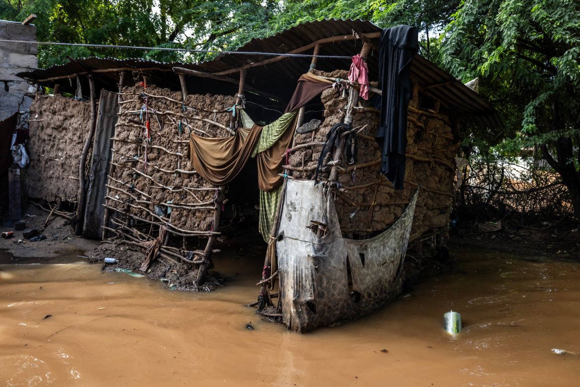 Collapsing houses are seen surrounded by water following flash floods in Garissa.