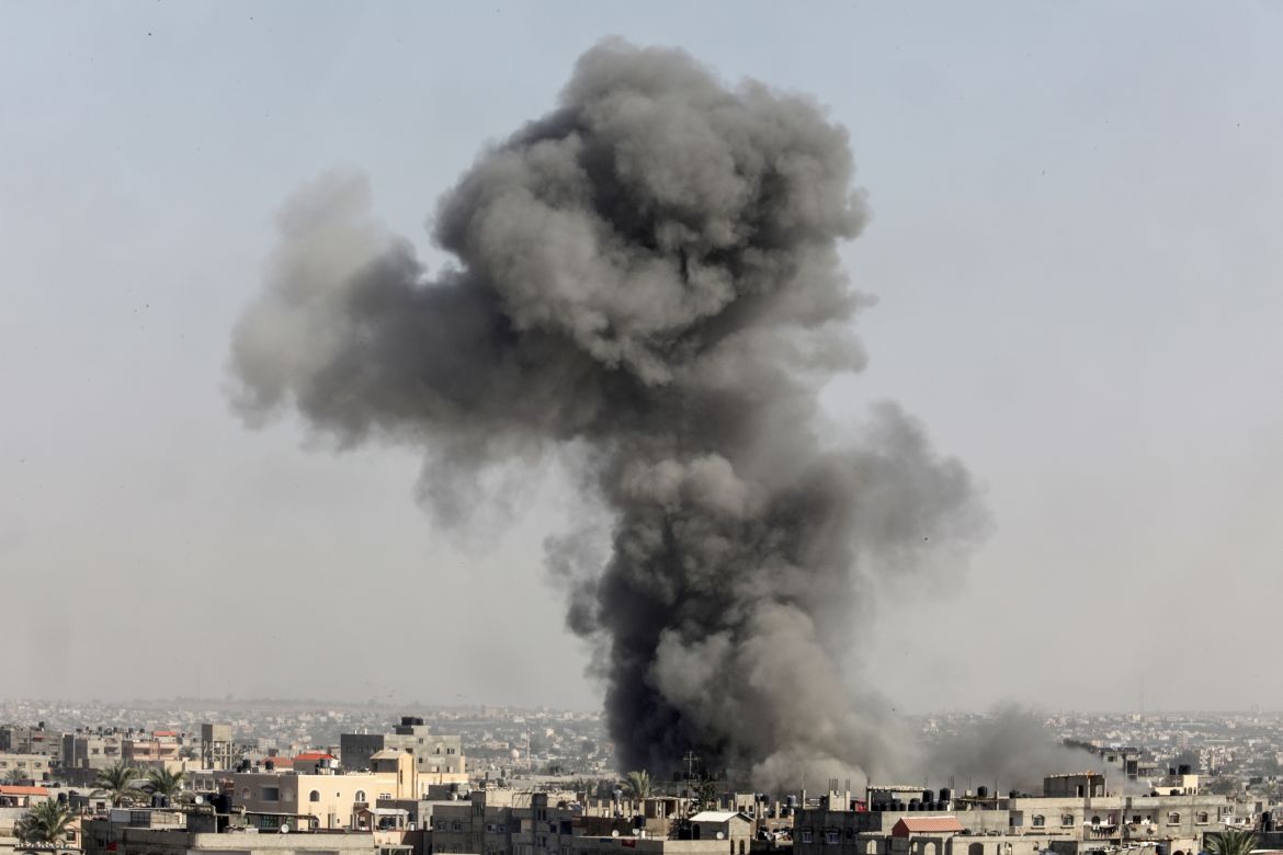 Smoke rises after Israeli attacks from air, sea and land targeted residential areas in Rafah, Gaza.
