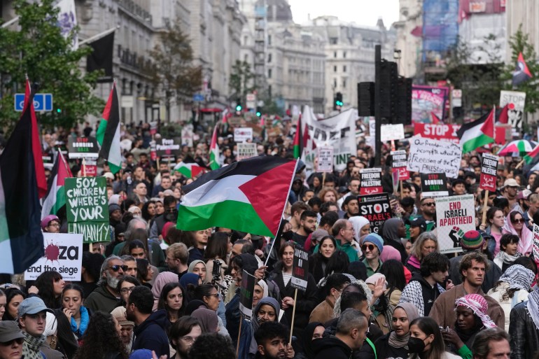 Protesters march during a pro Palestinian demonstration in London