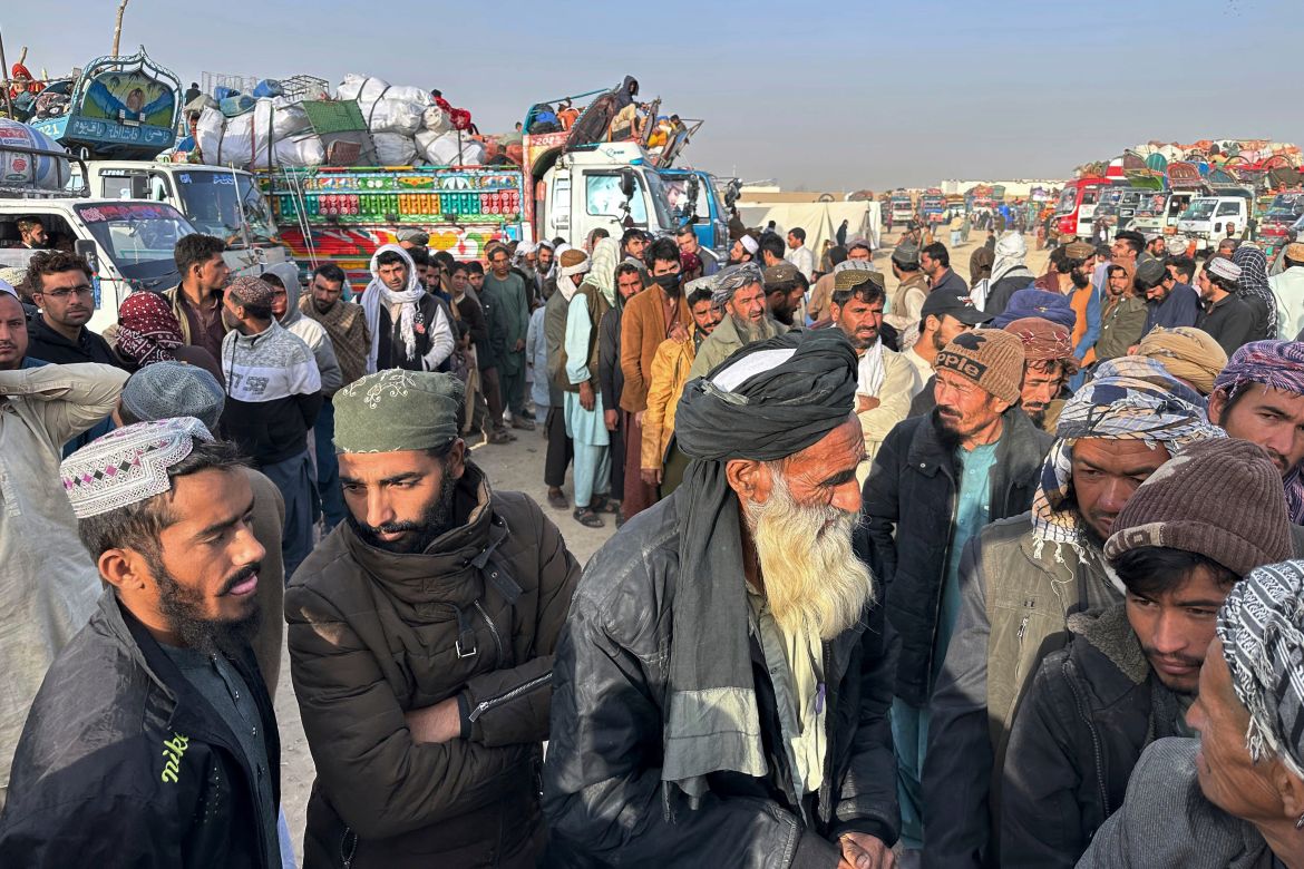 Afghans wait for clearance to depart for their homeland at a deportation camp set up by authorities to facilitate illegal immigrants, in Chaman, a town on the Pakistan-Afghanistan border.