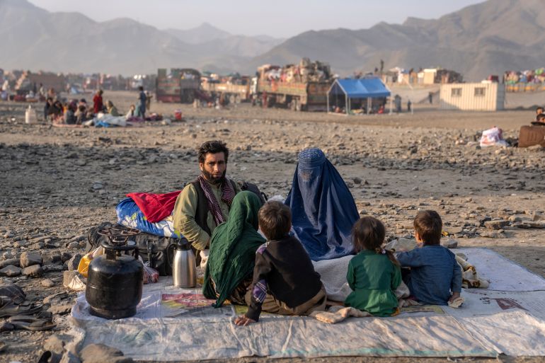 A huge number of Afghans refugees entered the Torkham border to return home hours before the expiration of a Pakistani government deadline for those who are undocumented to leave or face deportation. (AP Photo/Ebrahim Noroozi)