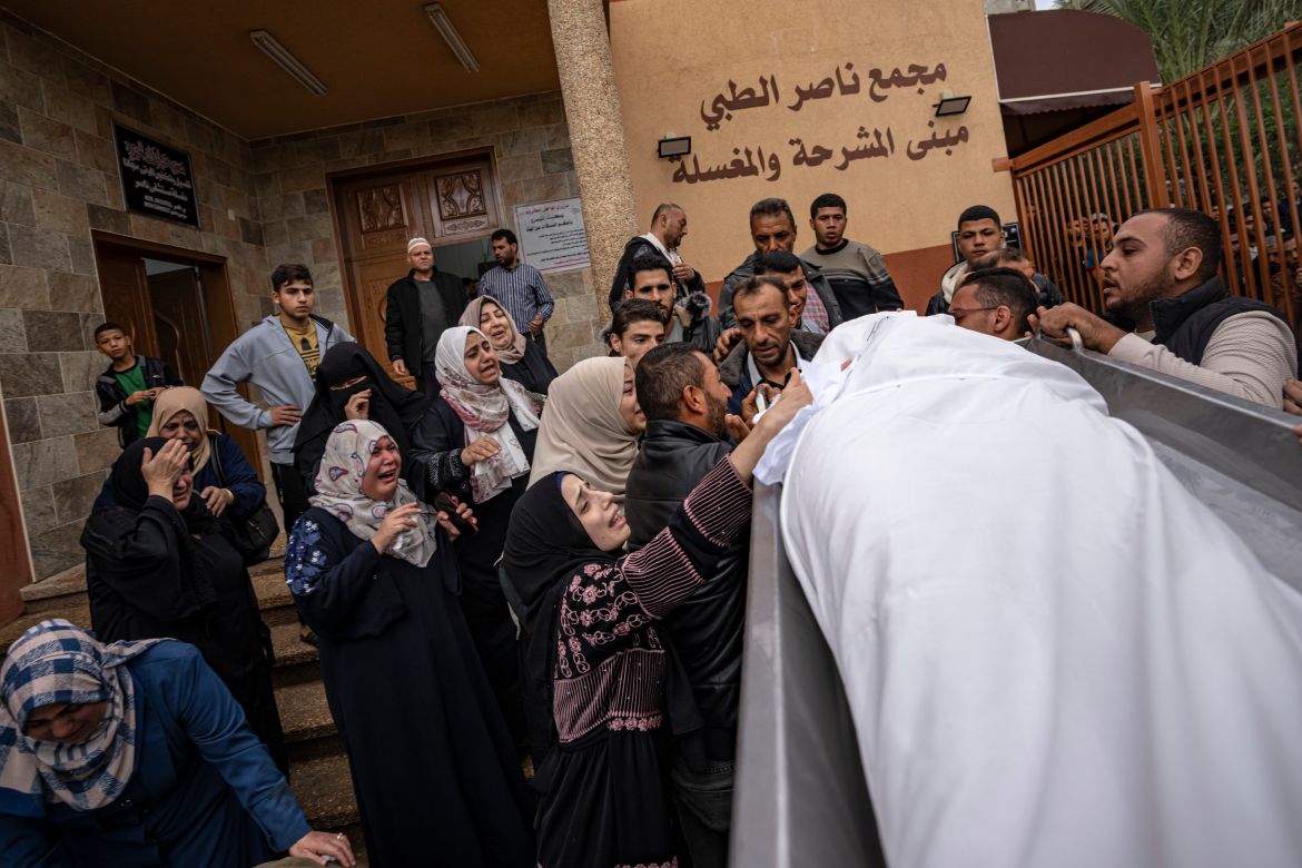 Palestinians mourn their relatives killed in the Israeli bombardment of the Gaza Strip, in the hospital in Khan Younis.