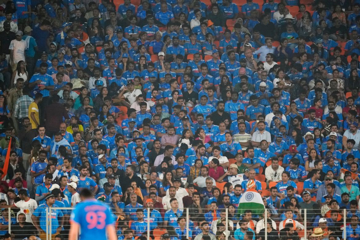 India fans sit dejected during the ICC Men's Cricket World Cup final match between Australia and India in Ahmedabad, India.
