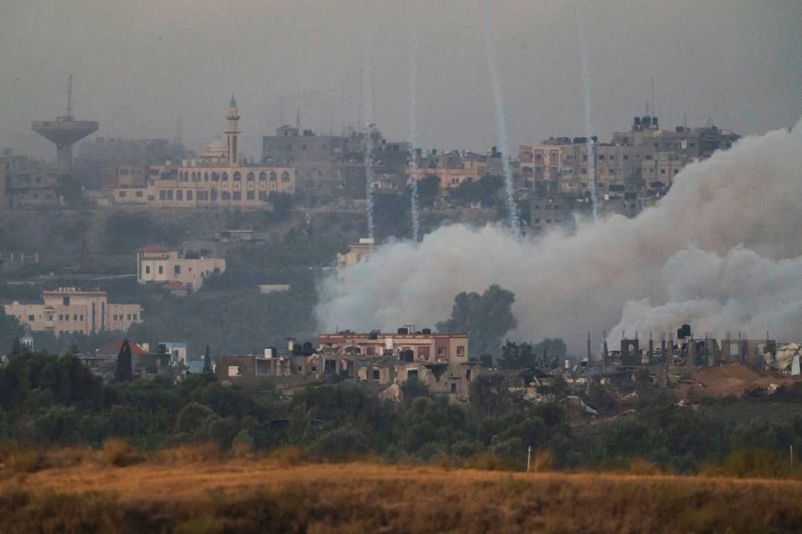 Smoke rises following an Israeli airstrike in the Gaza Strip, as seen from southern Israel, Tuesday, Nov. 21