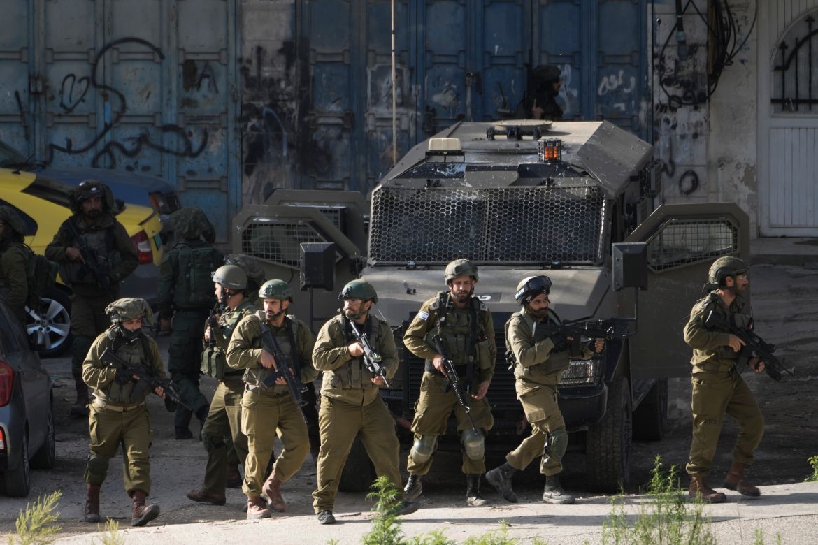 Israeli forces deploy during a raid on Balata, a Palestinian refugee camp in Nablus, West Bank