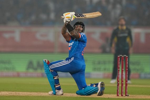 India's captain Suryakumar Yadav plays a shot during the first T20 cricket match between India and Australia in Visakhapatnam, India, Thursday, Nov. 23, 2023. (AP Photo/Mahesh Kumar A.)