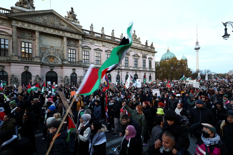In Berlin, around 6,500 people gathered for a demonstration that police said was taking place under strict conditions. [REUTERS/Liesa Johannssen]