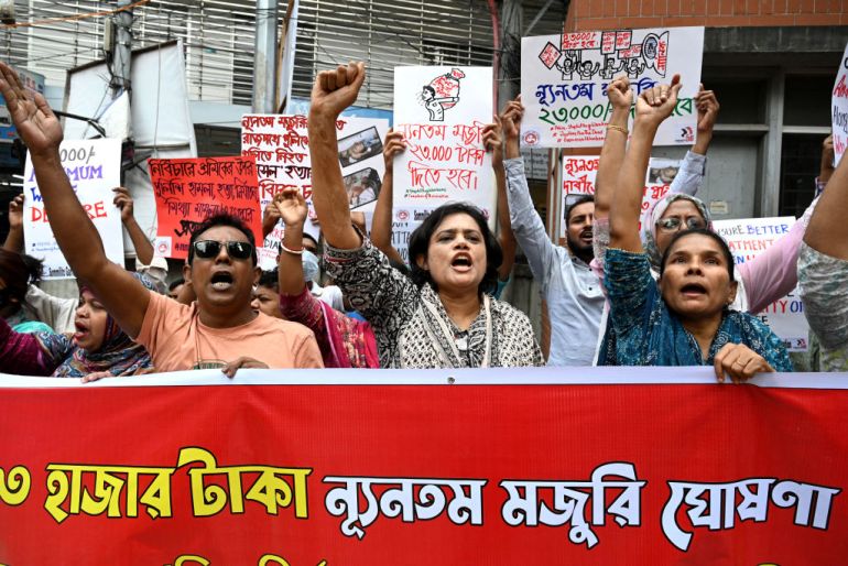 Activists of different garment workers' unions take part in a protest in front of the Minimum Wage Board office demanding rising ahead of a new minimum wage announcement in Dhaka, Bangladesh.