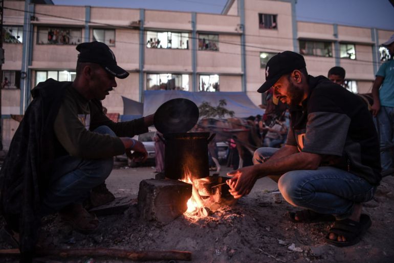 Palestinians who left their houses and live at the Nassr hospital, are trying to live under hard conditions during food shortages as the Israeli attacks continue in Gaza City, Gaza.