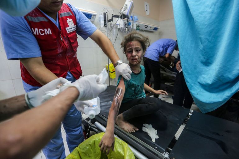 A Palestinian child receives treatment after Israeli air raids at Nasser Medical Hospital on November 7, 2023 in Khan Yunis, Gaza.