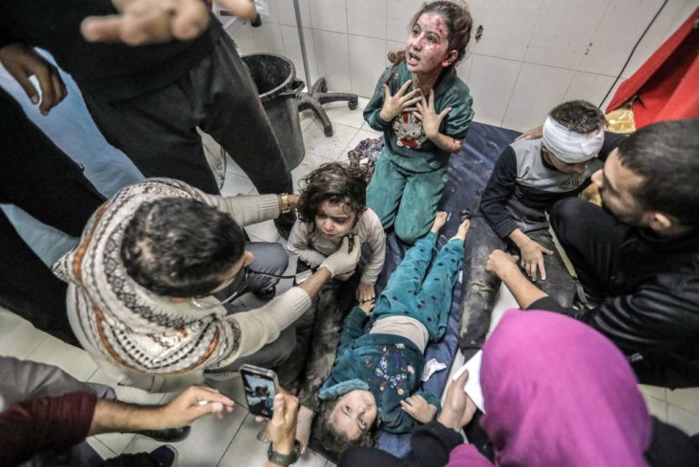 Palestinians injured in Israeli airstrikes arrive at Nasser Medical Hospital on November 23, 2023 in Khan Yunis, Gaza.