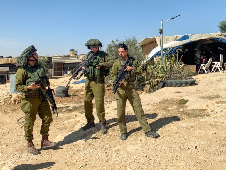 Soldiers enter Susiya [Steven Davidson/Al Jazeera]