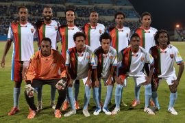 Eritrea national football team line just before the start of a World Cup qualifying match at Francistown&#039;s Stadium on October 13, 2015. Ten footballers from Eritrea&#039;s national squad sought political asylum in Botswana after the match [File: Monirul Bhuiyan/AFP]