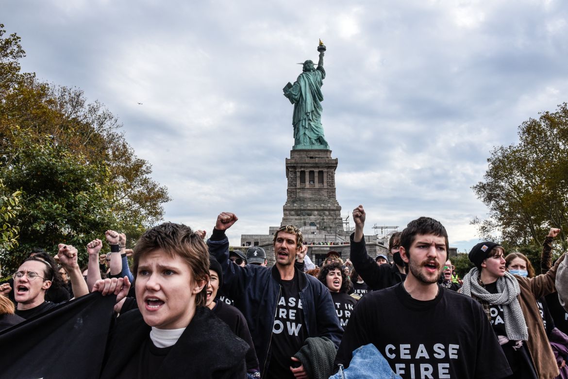 Activists from Jewish Voice for Peace occupy the Statue of Liberty