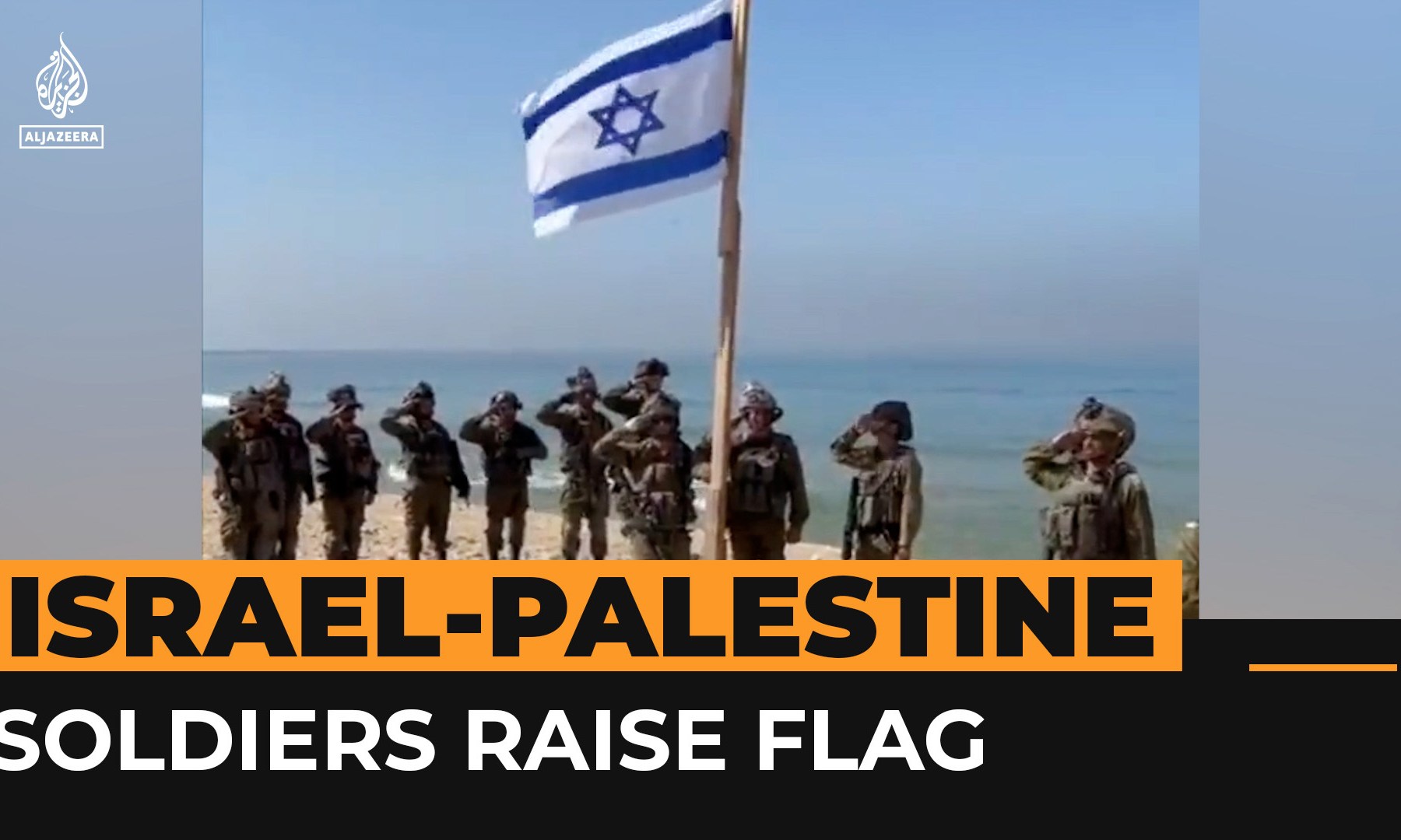 Israeli soldiers raise flag and sing anthem on Gaza beach