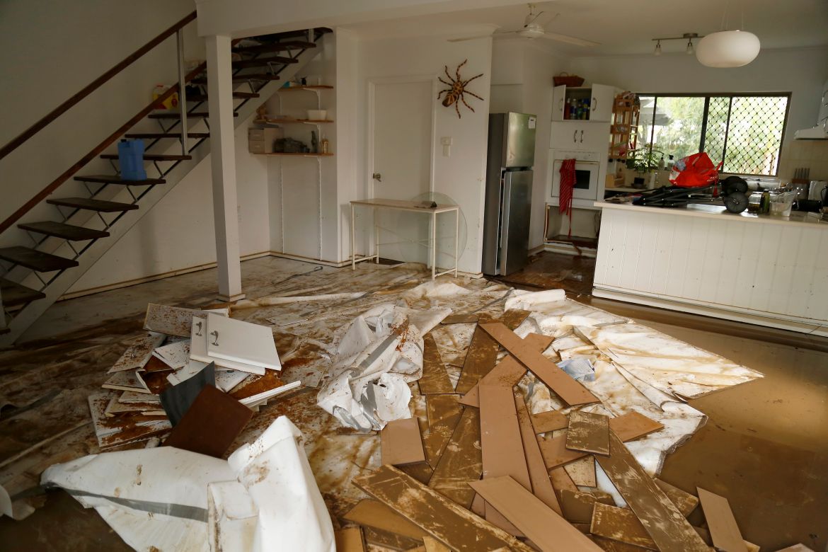 The home of local resident Lindsay is devastated and covered in mud after floods swept through the area in the suburb of Holloways Beach in Cairns, Queensland, Australia, 18 December