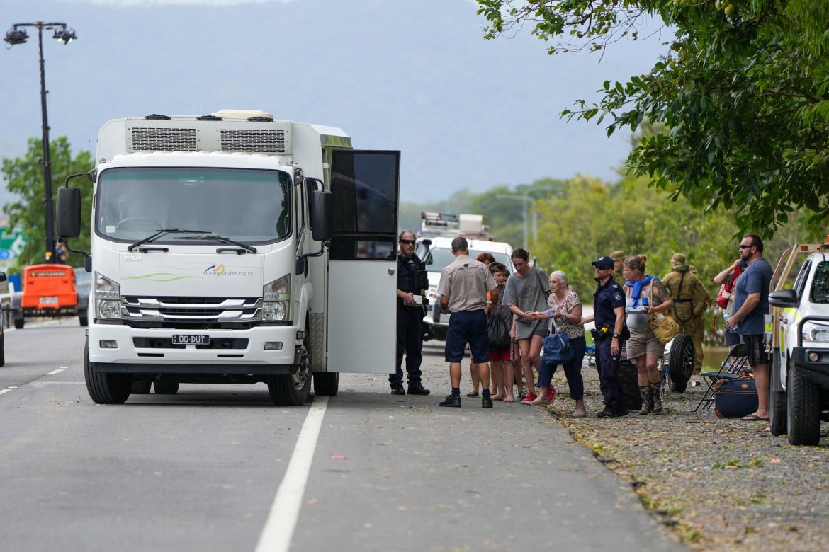 Residents are evacuated at Machan Beach in Cairns, Queensland, Australia, 18 December