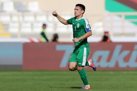 Turkmenistan's Arslanmyrat Amanov celebrates scoring
