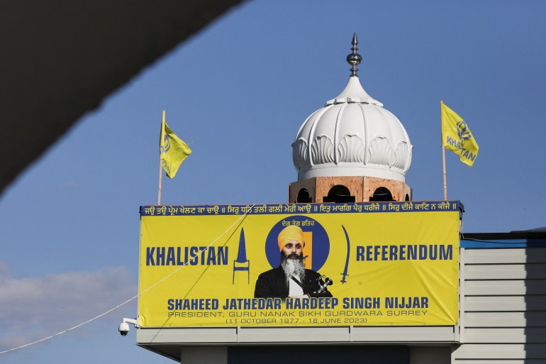 A banner with the image of Sikh leader Hardeep Singh Nijjar is seen at the Guru Nanak Sikh Gurdwara temple, site of his June 2023 killing, in Surrey, British Columbia, Canada September 20, 2023. REUTERS/Chris Helgren