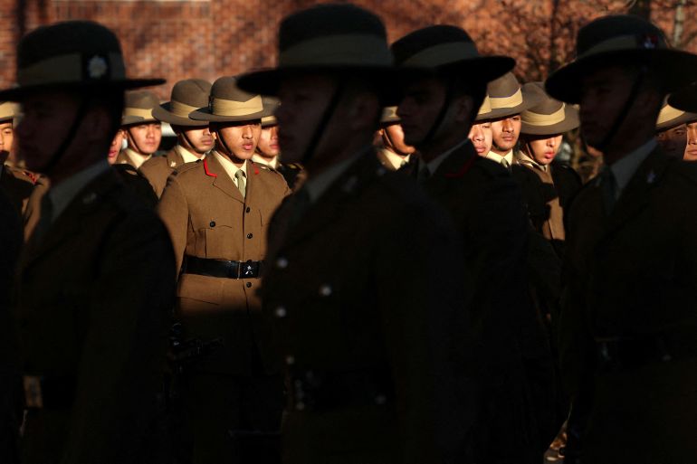 Soldiers from the Brigade of Gurkhas march on the Parade Ground during a passing out ceremony at Catterick Garrison near Richmond, Britain