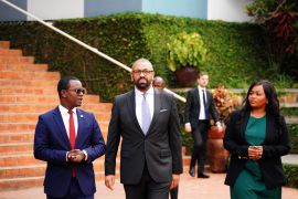 British Home Secretary James Cleverly tours the Kigali Genocide Memorial during his visit to Kigali, Rwanda, to sign a new treaty with Rwanda, on December 5, 2023 [Ben Birchall/Reuters]
