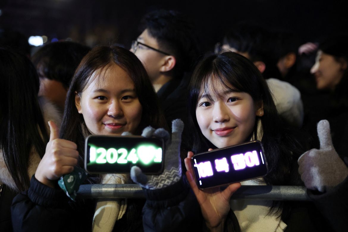 People attend a ceremony to celebrate the new year in Seoul, South Korea, December 31, 2023.