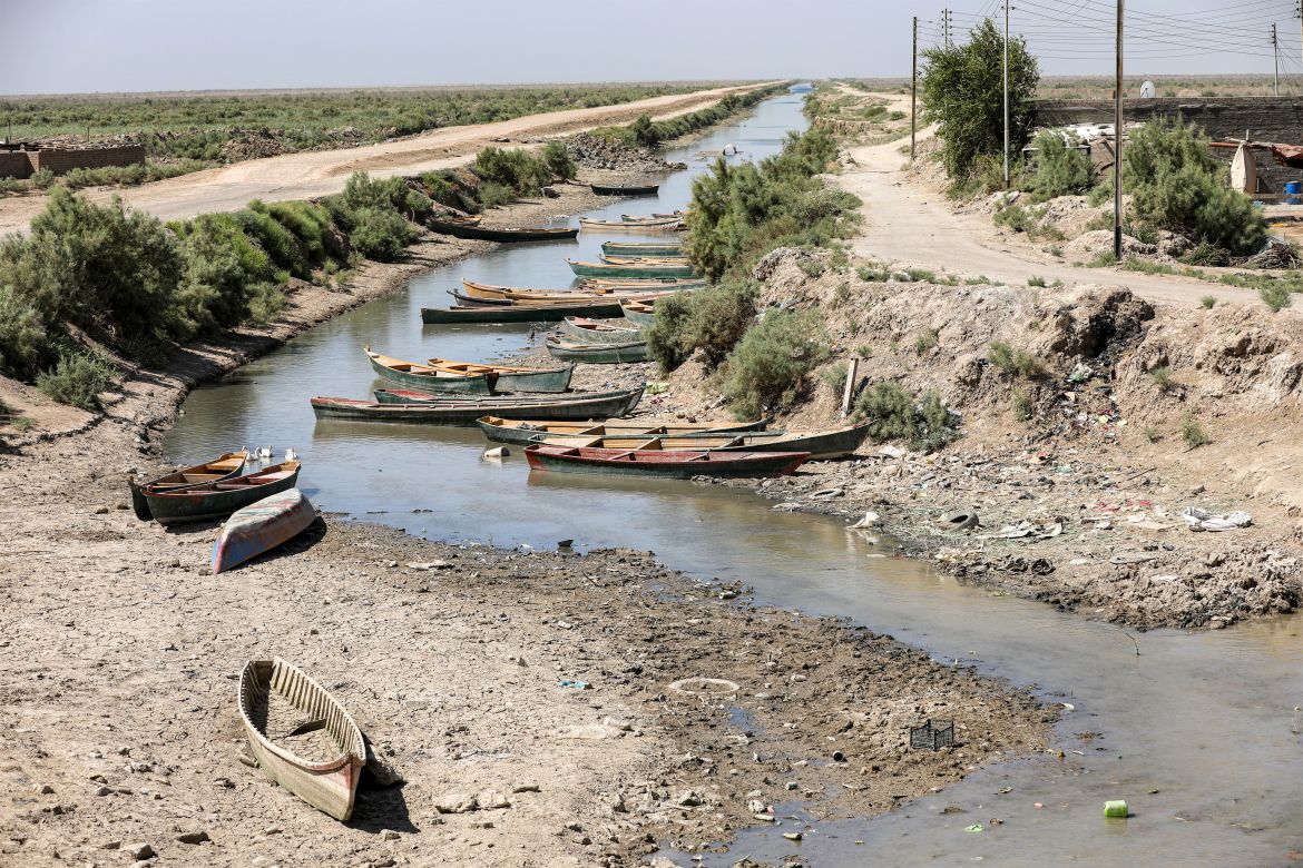 Fishermen's boats lie close to the drying riverbed of the Amshan river, which is fed by the Tigris, in al-Majar al-Kabir in Iraq's southeastern Maysan governorate.