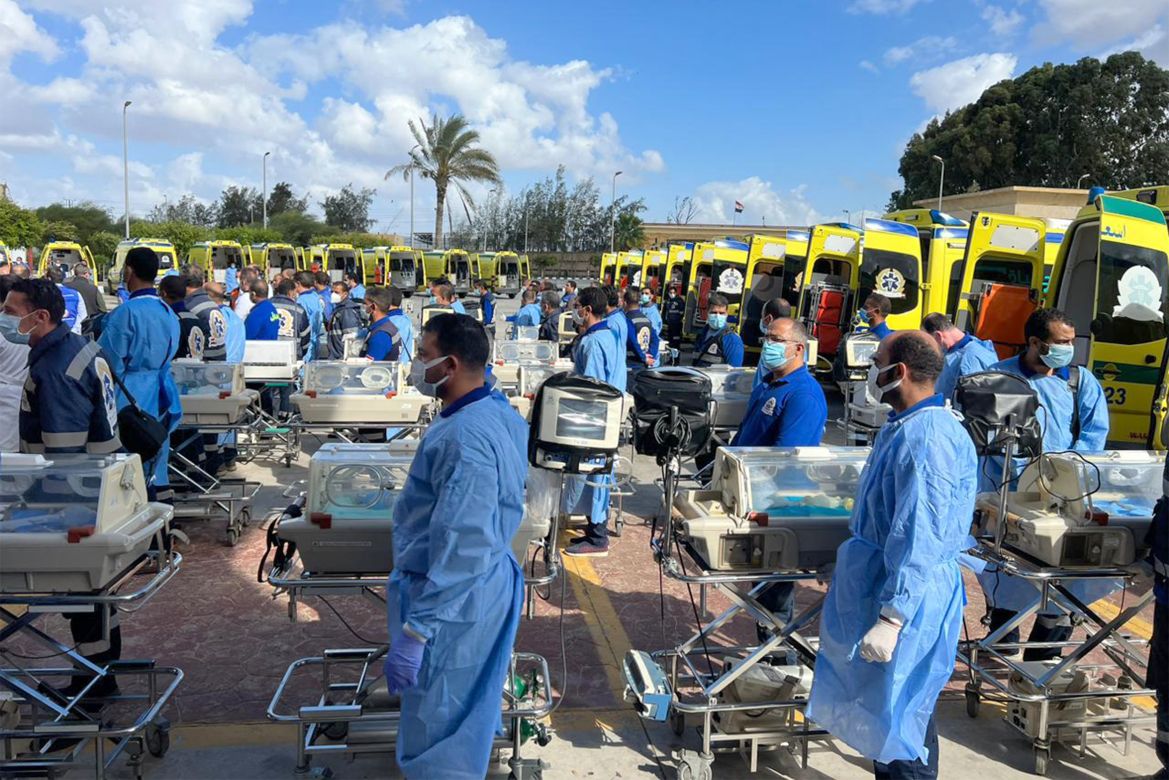 Egyptian medics stand by with incubators to receive premature Palestinian babies evacuated from Gaza on the Egyptian side of the Rafah border crossing with the Gaza Strip.