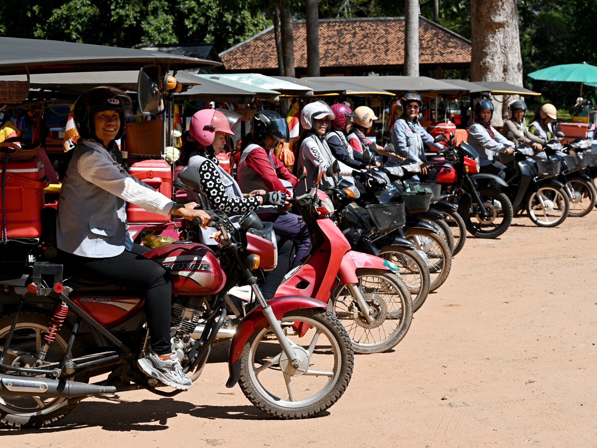 Cambodia’s female tuk-tuk drivers fight prejudice on road to equality