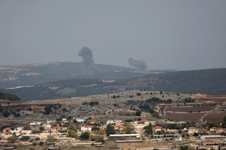 A picture taken from the Israeli side of border with Lebanon shows Israeli shelling around the southern Lebanese village of Aita al-Shaab on December 5