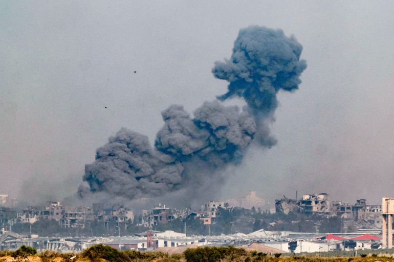 smoke billowing during Israeli bombardment in Gaza