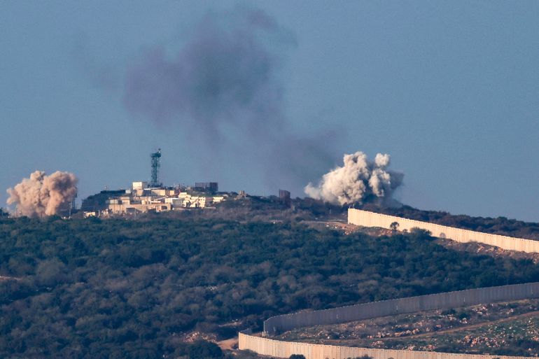 A picture taken from the Israeli side of border with Lebanon shows smoke billowing following Israeli bombardment around the southern Lebanese village of Aita al-Shaab