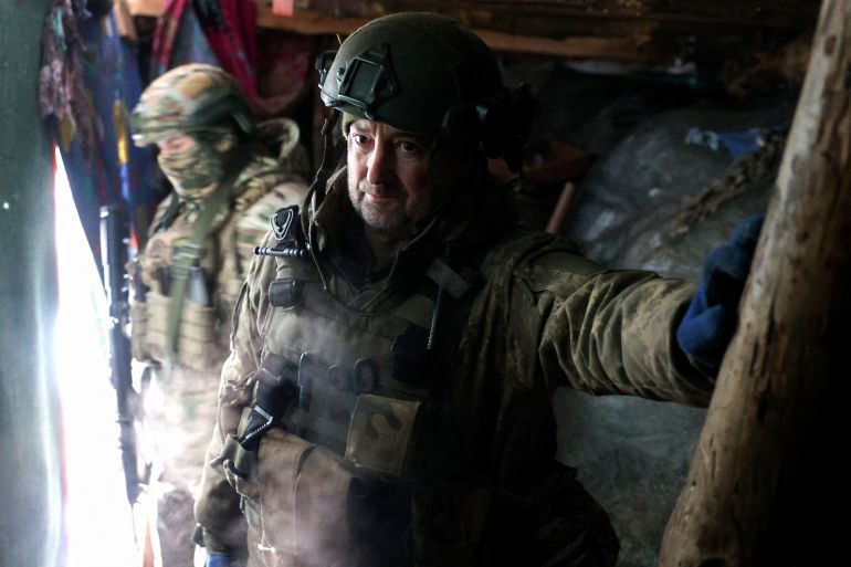Ukrainian soldiers in a trench on the front line.