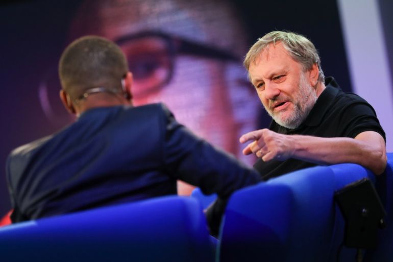 epa07087609 Slovenian philosopher Slavoj Zizek (R) speaks at the authors' forum 'Blue Sofa' during the book fair 'Frankfurter Buchmesse 2018', in Frankfurt am Main, Germany, 12 October 2018. The 70th edition of the international Frankfurt Book Fair, described as the 'world's most important fair for the print and digital content business' runs from 10 to 14 October and gathers authors, writers and celebrities from all over the world. This year's Guest of Honour country is Georgia. EPA-EFE/HAYOUNG JEON
