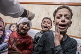 Injured children are brought to Al-Aqsa Martyrs Hospital for treatment after an Israeli attack in Deir el-Balah, Gaza, on December 2, 2023. [Ali Jadallah/Anadolu Agency]