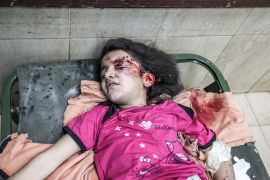 An injured Palestinian child is taken to the Al-Aqsa Martyrs Hospital as Israeli attacks continue in Deir al-Balah. [Ali Jadallah/Anadolu]