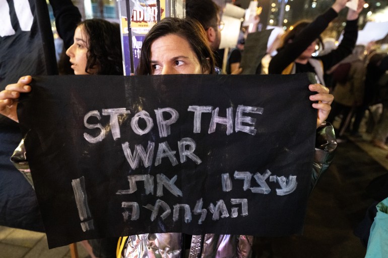 Israeli activists gather in front of Ministry of Defense to protest the attacks on Gaza and call for ceasefire in Tel Aviv, Israel on December 05