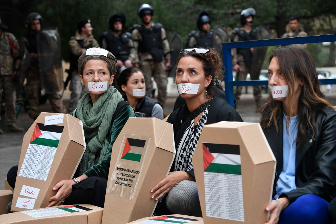 People, holding cardboard coffins, gather to stage demonstration to show solidarity with Palestinians and demand ceasefire for Israeli attacks on Gaza in Beirut, Lebanon on December 08
