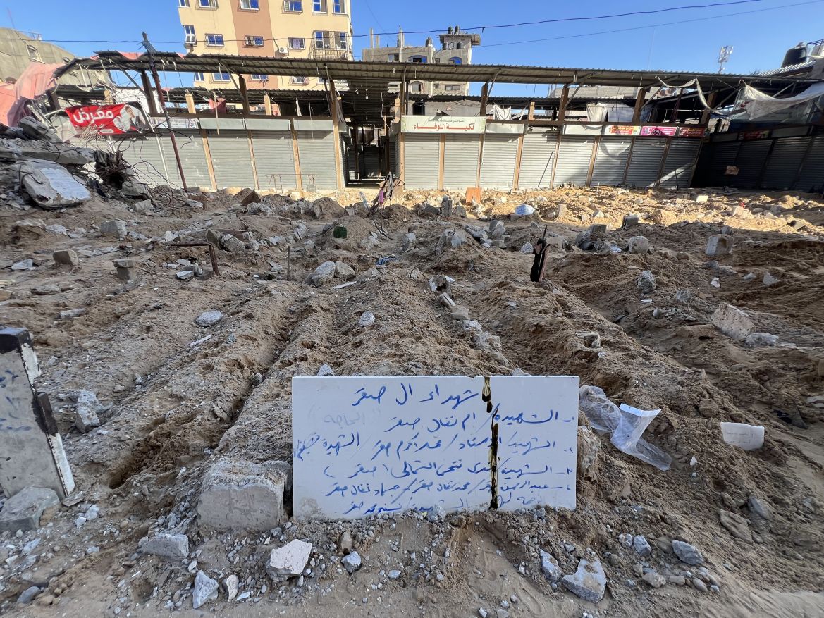 Bodies of the Palestinians died in Israeli attacks are buried to empty fields around the streets as the death toll increases due to the constant Israeli attacks in Jabalia, Gaza.