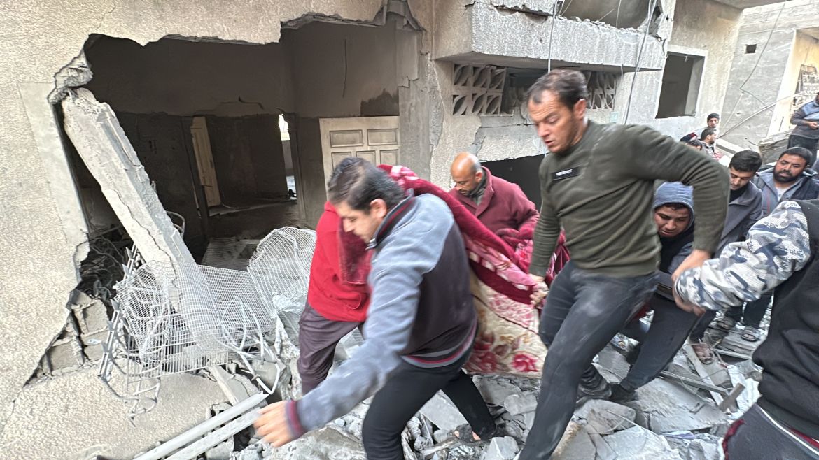 Civil defense teams and local residents conduct a search and rescue operation in the rubble of the destroyed buildings following Israeli attacks hit Jabalia Camp in Jabalia, Gaza.