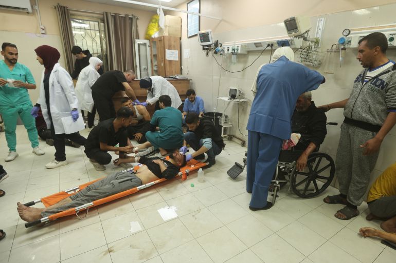 Injured Palestinians, including children, are brought to Nasser Hospital to receive medical treatment following Israeli attacks in Khan Yunis, Gaza.