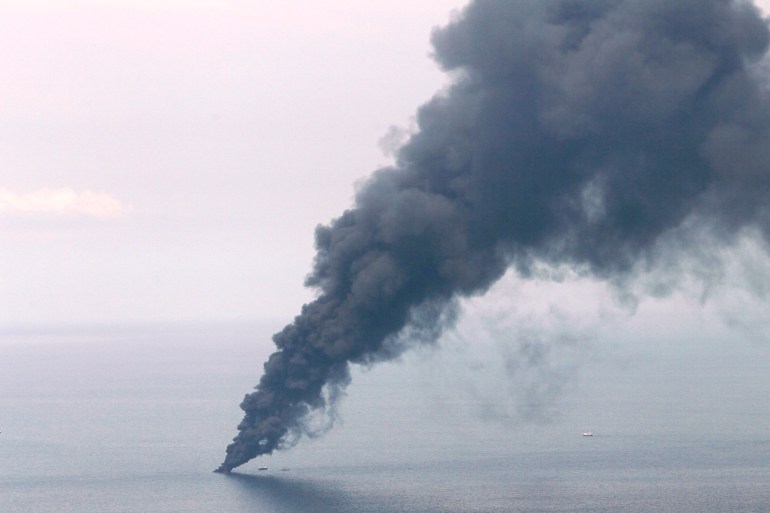 A plume of smoke from an oil burn is seen near the site of the Deepwater Horizon oil spill in the Gulf of Mexico off the coast of Louisiana