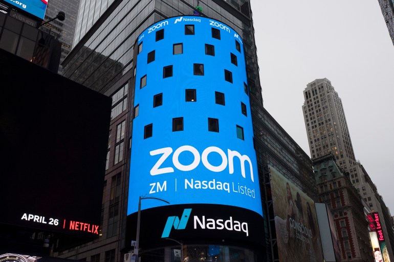 a sign for Zoom Video Communications ahead of the company's Nasdaq IPO in New York