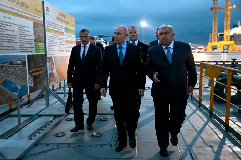 Russian President Vladimir Putin and the CEO of Rosneft oil company, Igor Sechin, visit the Zvezda Shipbuilding Complex in the far eastern region of Primorsky Krai, Russia, on September 11, 2023