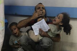 Wounded Palestinians receive treatment at the al-Shifa hospital, following Israeli airstrikes on Gaza City, central Gaza Strip