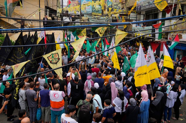 People gather during a protest in solidarity with the Palestinian people in Gaza, after Friday prayers at Bourj al-Barajneh Palestinian refugee camp, in Beirut, Lebanon, Friday, Oct. 27, 2023. (AP Photo/Bilal Hussein)