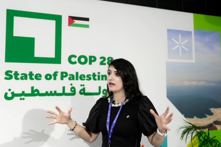 A climate expert with the Palestinian Authority addresses reporters