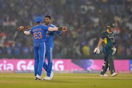India celebrate the dismissal of Australia&#039;s Ben McDermott [Mahesh Kumar A/AP Photo]